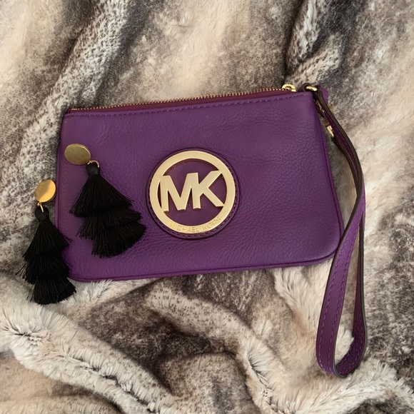 Michael Kors Handbags - Purple leather Michael Kors wristlet